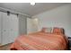 Comfortable bedroom with shiplap accent wall and sliding closet doors at 480 Friar Tuck Cir, Covington, GA 30014