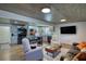 Spacious open-concept living area with a kitchen, cozy seating, and modern amenities at 480 Friar Tuck Cir, Covington, GA 30014