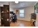 This office features hard wood floors, and a large window with a lake view at 480 Friar Tuck Cir, Covington, GA 30014
