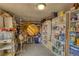 Unfinished storage room with shelves stocked with canned goods at 480 Friar Tuck Cir, Covington, GA 30014