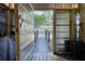 Sun room with open door to bridge and backyard at 480 Friar Tuck Cir, Covington, GA 30014