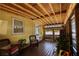 Enclosed sun room with wicker furniture and lake views at 480 Friar Tuck Cir, Covington, GA 30014
