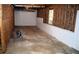Unfinished basement offering potential and featuring exposed insulation and a single window at 1521 Larkwood Dr, Canton, GA 30114