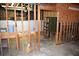 Unfinished basement space shows exposed framing and potential customization at 1521 Larkwood Dr, Canton, GA 30114