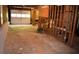 Unfinished basement with door to garage shows exposed framing with potential for customization at 1521 Larkwood Dr, Canton, GA 30114