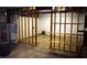 Unfinished basement offering exposed utilities, framing, and space for renovation or storage at 1521 Larkwood Dr, Canton, GA 30114