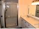 Modern bathroom with a glass-enclosed shower, tile, and a vanity with storage at 1521 Larkwood Dr, Canton, GA 30114