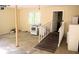 Bonus room with ramp and appliances, featuring neutral walls and potential for various uses at 1521 Larkwood Dr, Canton, GA 30114