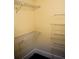 Walk-in closet with white-wire shelving, providing ample storage space at 1521 Larkwood Dr, Canton, GA 30114