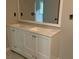 Bathroom features a double vanity, quartz countertop and framed mirror at 1871 Kinridge Rd, Marietta, GA 30062