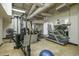 Well-equipped gym with a variety of machines and weights for residents at 20 Marietta St # 4B, Atlanta, GA 30303