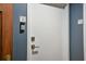 Hallway showing apartment number and doorbell outside of a unit door at 20 Marietta St # 4B, Atlanta, GA 30303