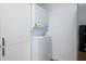 In unit laundry featuring a stacked washer dryer unit at 20 Marietta St # 4B, Atlanta, GA 30303