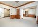 Open living area with multiple entrances and traditional wood accents at 20 Marietta St # 4B, Atlanta, GA 30303