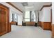 Spacious living room featuring large windows, detailed trim, and neutral carpeting at 20 Marietta St # 4B, Atlanta, GA 30303