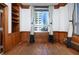 Office space with built in storage and city views from the window at 20 Marietta St # 4B, Atlanta, GA 30303