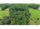 Aerial image of a wooded homesite with sprawling green space, offering privacy and scenic views at 527 Gaddis Rd, Canton, GA 30115