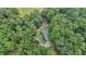 Aerial perspective of a home nestled among thick trees, highlighting its secluded location at 527 Gaddis Rd, Canton, GA 30115