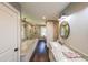 Bright bathroom featuring a soaking tub, glass enclosed shower, and granite countertops at 527 Gaddis Rd, Canton, GA 30115