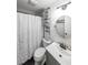 Bright bathroom with white wainscoting, a shower, and a vanity with a sink at 527 Gaddis Rd, Canton, GA 30115