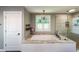Bathroom features a large tub with granite countertops and a glass-enclosed shower at 527 Gaddis Rd, Canton, GA 30115
