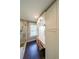 This bathroom includes a glass enclosed shower, built in vanity, and hardwood floors at 527 Gaddis Rd, Canton, GA 30115