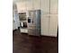 Kitchen featuring stainless steel refrigerator, modern appliances, and abundant cabinet space at 527 Gaddis Rd, Canton, GA 30115