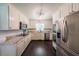 Modern kitchen featuring stainless steel appliances, granite countertops, and lots of storage at 527 Gaddis Rd, Canton, GA 30115