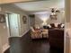 Cozy living area with hardwood floors, comfortable seating, and a warm, inviting atmosphere. Modern appliances at 527 Gaddis Rd, Canton, GA 30115