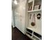 This mud room features built-in storage cabinets and shelving with a bench and decor at 527 Gaddis Rd, Canton, GA 30115