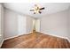Bright bedroom with new hardwood flooring and two closets at 610 Durham Ridge Nw Dr, Lilburn, GA 30047