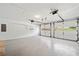 Spacious two car garage with white doors, shelving, and storage; a practical space for vehicles and storage at 610 Durham Ridge Nw Dr, Lilburn, GA 30047