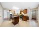 Updated kitchen featuring stainless steel appliances, center island, tile floors and plenty of cabinet space at 610 Durham Ridge Nw Dr, Lilburn, GA 30047