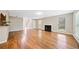 Cozy living room features fireplace, wood floors, and natural light, perfect for relaxing or entertaining at 610 Durham Ridge Nw Dr, Lilburn, GA 30047