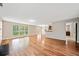 Spacious living room with hardwood floors, lots of natural light, and neutral paint at 610 Durham Ridge Nw Dr, Lilburn, GA 30047