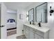 Stylish bathroom with double vanity, modern fixtures, and neutral color palette at 1705 Ezra Church Nw Dr, Atlanta, GA 30314
