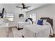 Cozy bedroom with two twin beds, a soft rug, and bright, natural light at 1705 Ezra Church Nw Dr, Atlanta, GA 30314