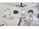 Well-lit bedroom featuring two twin beds, modern decor, and a ceiling fan at 1705 Ezra Church Nw Dr, Atlanta, GA 30314