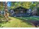 Charming home with a covered front porch, landscaped yard and fresh exterior paint at 1705 Ezra Church Nw Dr, Atlanta, GA 30314