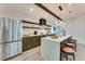 Modern kitchen featuring a center island with quartz counters, stainless appliances, and sleek cabinets at 1705 Ezra Church Nw Dr, Atlanta, GA 30314