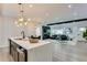 Bright open concept living space with modern lighting and elegant decor at 1705 Ezra Church Nw Dr, Atlanta, GA 30314