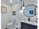Contemporary powder room with unique lighting fixtures and a sleek vanity at 1705 Ezra Church Nw Dr, Atlanta, GA 30314