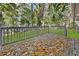 Back deck overlooking a lush green yard with a full canopy of trees at 1971 Westley Dr, Riverdale, GA 30296