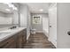 Bathroom with a double vanity with storage, granite countertop, tub and shower at 1971 Westley Dr, Riverdale, GA 30296