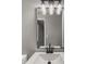 Stylish bathroom vanity with a sleek faucet and modern lighting fixture at 1971 Westley Dr, Riverdale, GA 30296