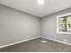 Cozy bedroom with soft carpet, neutral paint, and a window with natural light at 1971 Westley Dr, Riverdale, GA 30296