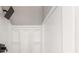 The shower features a dark rain style shower head with cubbies for storage at 1971 Westley Dr, Riverdale, GA 30296