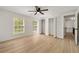 Bright bedroom features hardwood floors, a ceiling fan, and two large closets at 220 Hobnail Se Ct, Marietta, GA 30067
