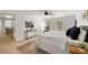 Spacious bedroom featuring hardwood floors, neutral walls, ceiling fan and natural light at 220 Hobnail Se Ct, Marietta, GA 30067