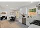 Modern kitchen with stainless steel appliances, white cabinets, and a farmhouse sink at 220 Hobnail Se Ct, Marietta, GA 30067